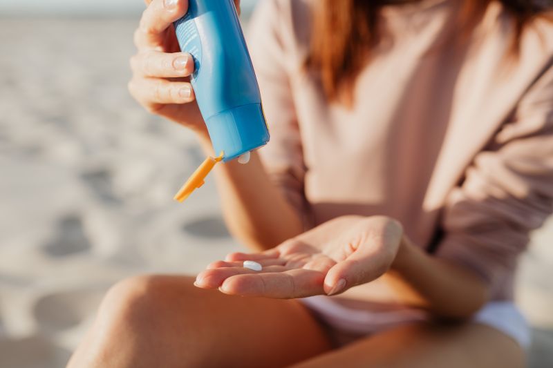 fotografia, al mare con la crema solare
